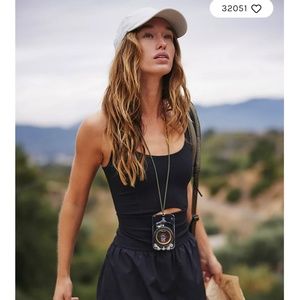 New With Tags Free People Movement Righteous Runsie in Black. Size Medium.